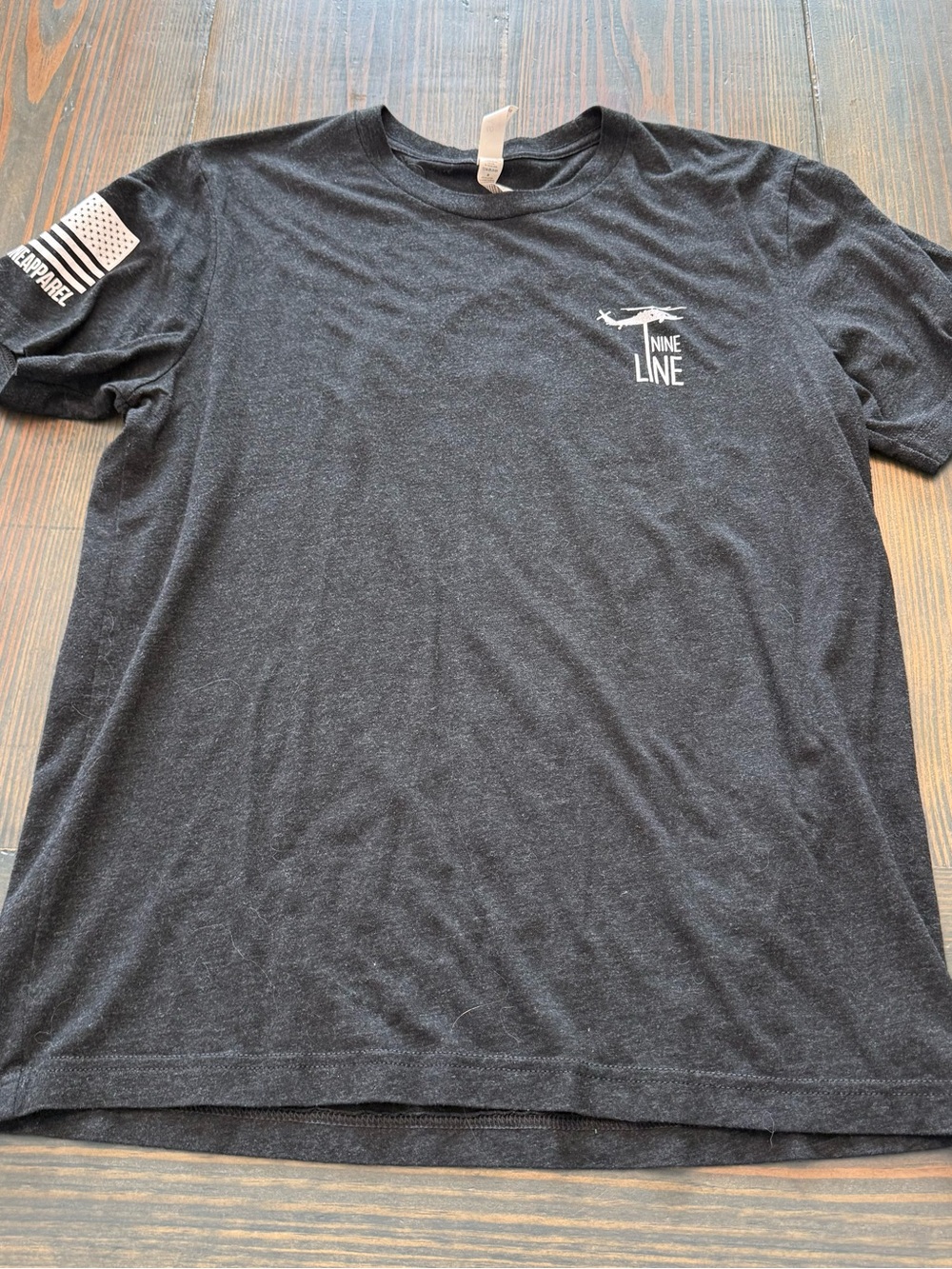 Nine Line Black Short-Sleeve Tee with American Flag Graphic on Back